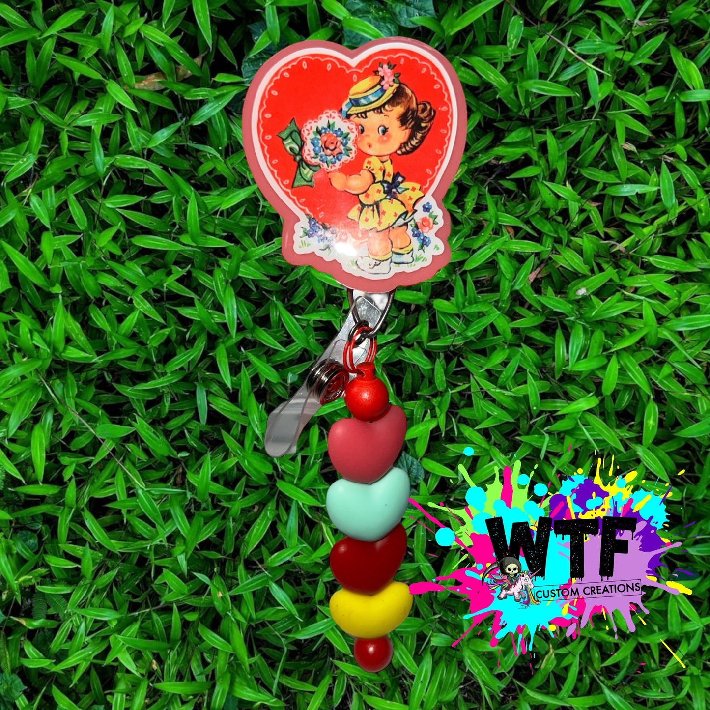 Doll Red Heart Badge Reel